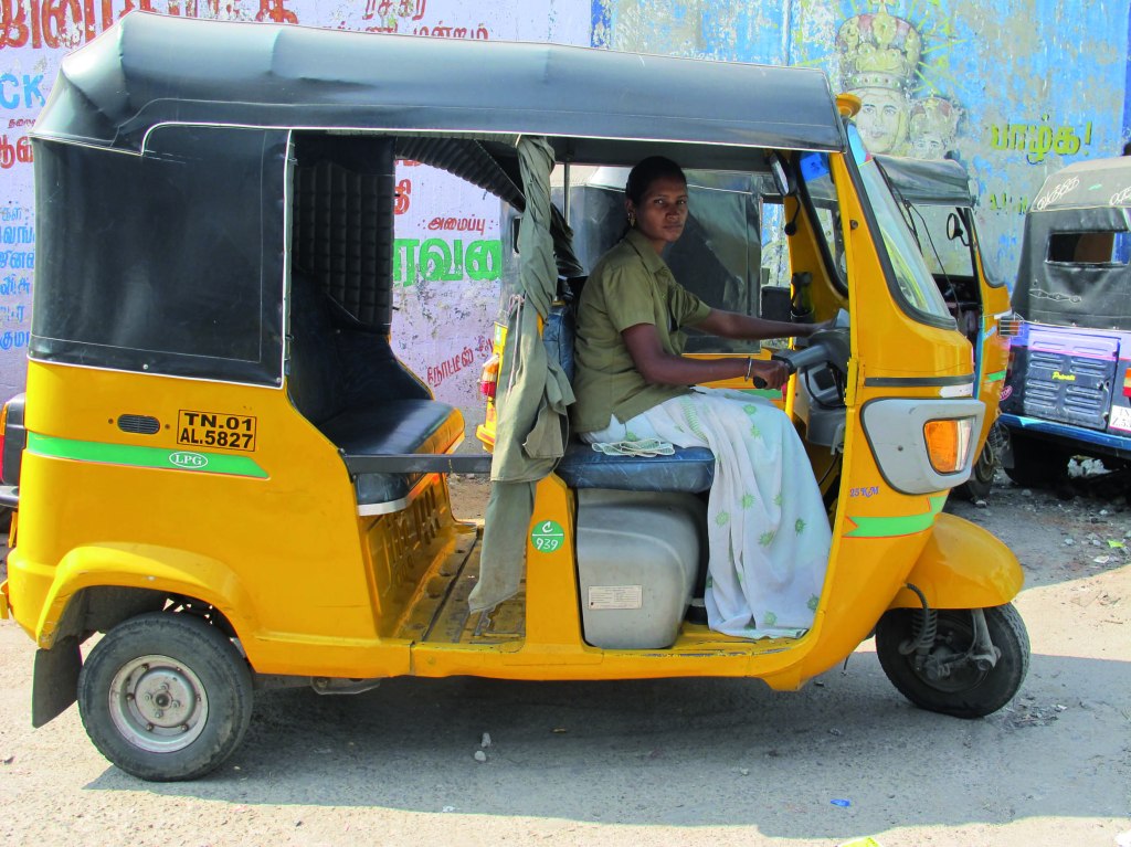 India. Mala, driver di auto-rickshaw