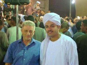 A sinistra, padre Giuseppe Scattolin